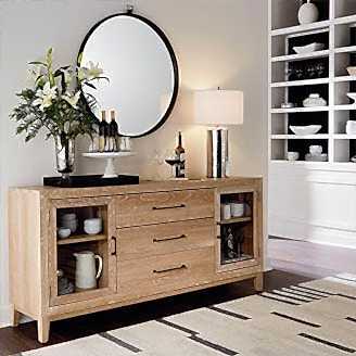 Oak credenza with lamp and decor on top