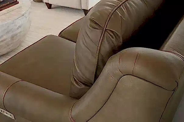 Stationary reclining leather chair